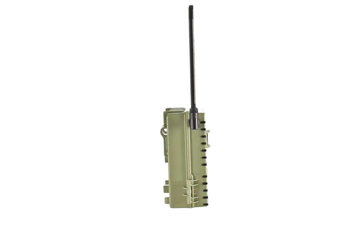 Wireless hunting trail camera with long-range antenna for outdoor game tracking.